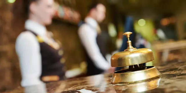 Modern luxury hotel reception counter desk with bell