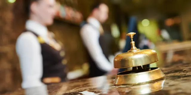 Modern luxury hotel reception counter desk with bell