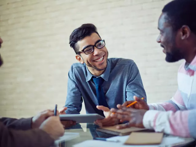 Group of modern managers speculating about working plans