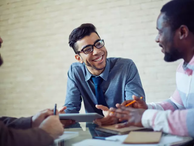 Group of modern managers speculating about working plans