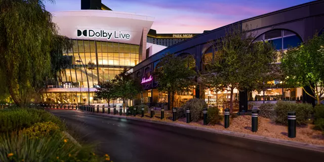 Exterior shows the Dolby Live indoor amphitheater next to the Park MGM resort.