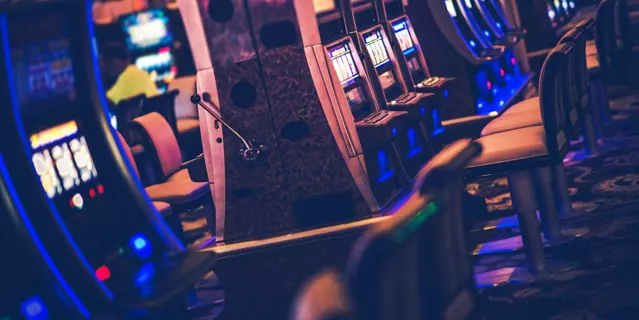 Casino Gambling Machines. Rows of Slot Machines and Other Video Money Games. Las Vegas, Nevada.