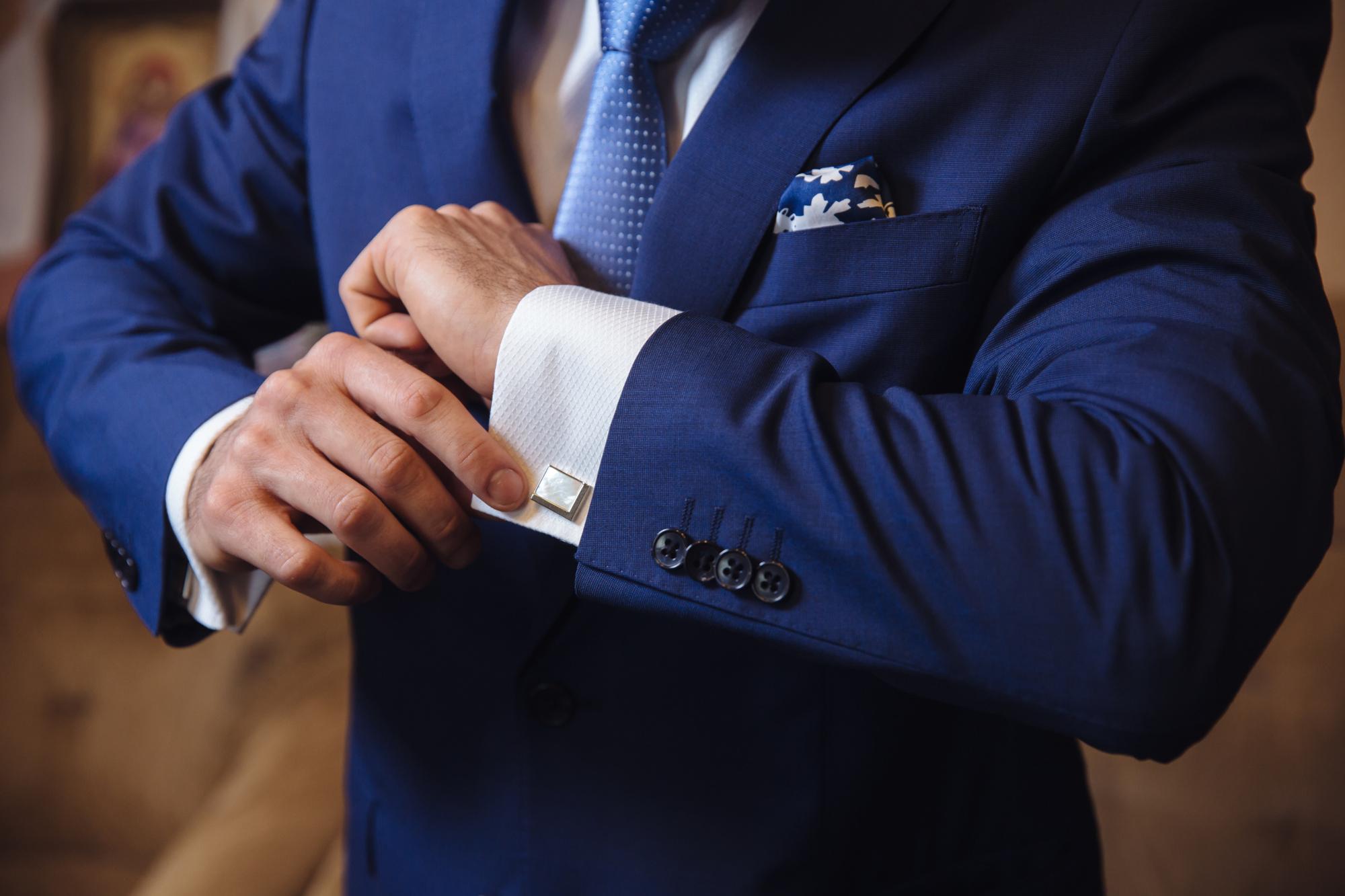 Business man hands with cufflinks. Elegant gentleman clother