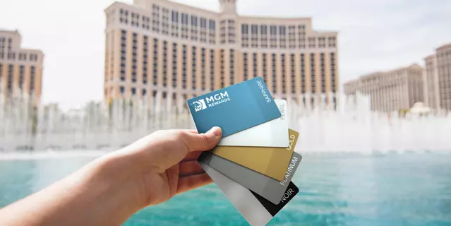 MGM Rewards Cards with Fountains of Bellagio in the background