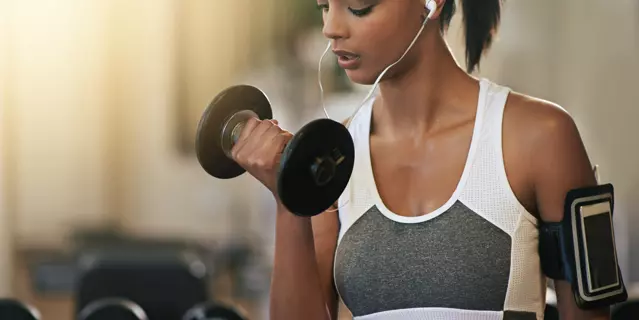 Shot of a young woman working out with dumbbells at the gymhttp://195.154.178.81/DATA/i_collage/pi/shoots/805475.jpg