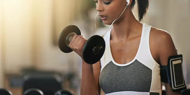 Shot of a young woman working out with dumbbells at the gymhttp://195.154.178.81/DATA/i_collage/pi/shoots/805475.jpg