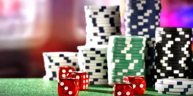Casino Dice with Chips on Table