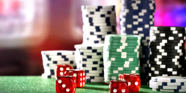 Casino Dice with Chips on Table