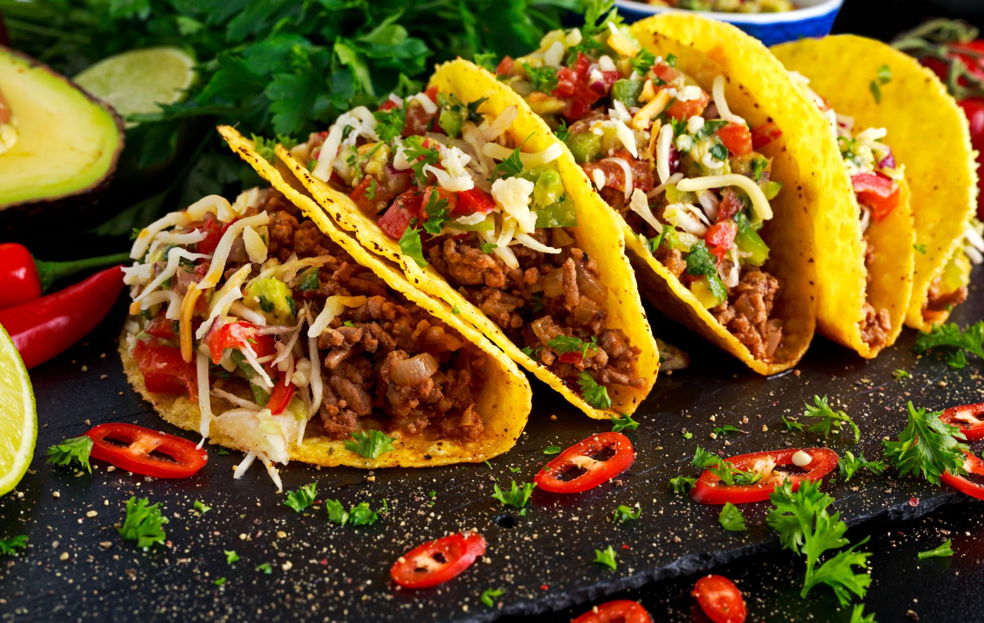 Mexican food - delicious taco shells with ground beef and home made salsa.