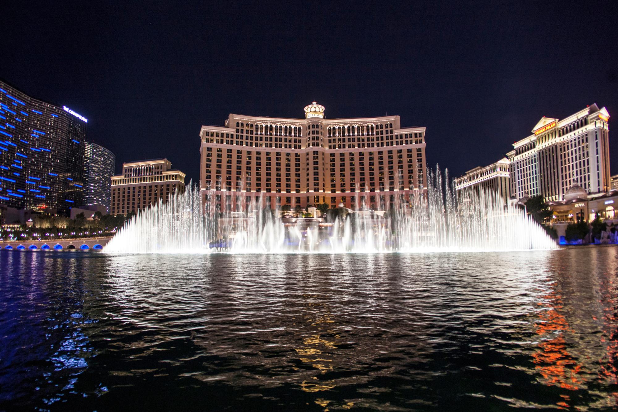 LAS VEGAS - JUNE 15, 2012: Las Vegas Bellagio Hotel Casino, featured with its world famous fountain show, at night with fountains in Las Vegas, Nevada.