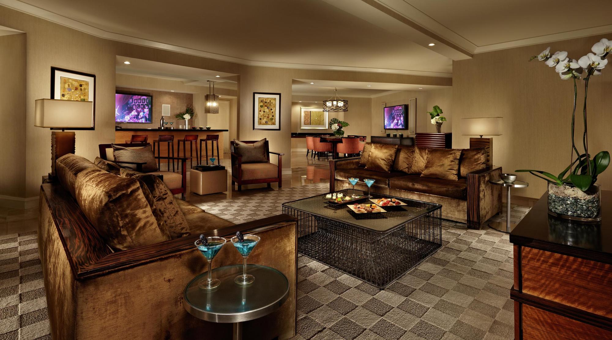 Three 65" plasmas and a built-in bar for the resortist, and 39 of his (or her) closest friends.