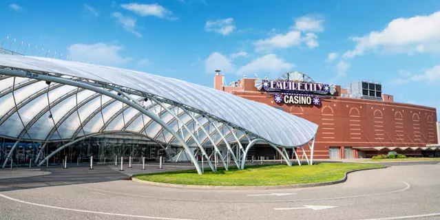 Exterior of Empire City Casino shows a dome-shaped covering in front of the entrance.