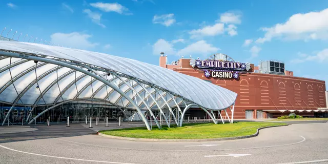 Exterior of Empire City Casino shows a dome-shaped covering in front of the entrance.