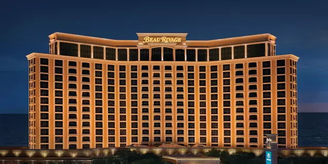 Exterior of Beau Rivage at night shows 13 floors and over 200 windows on the facade.