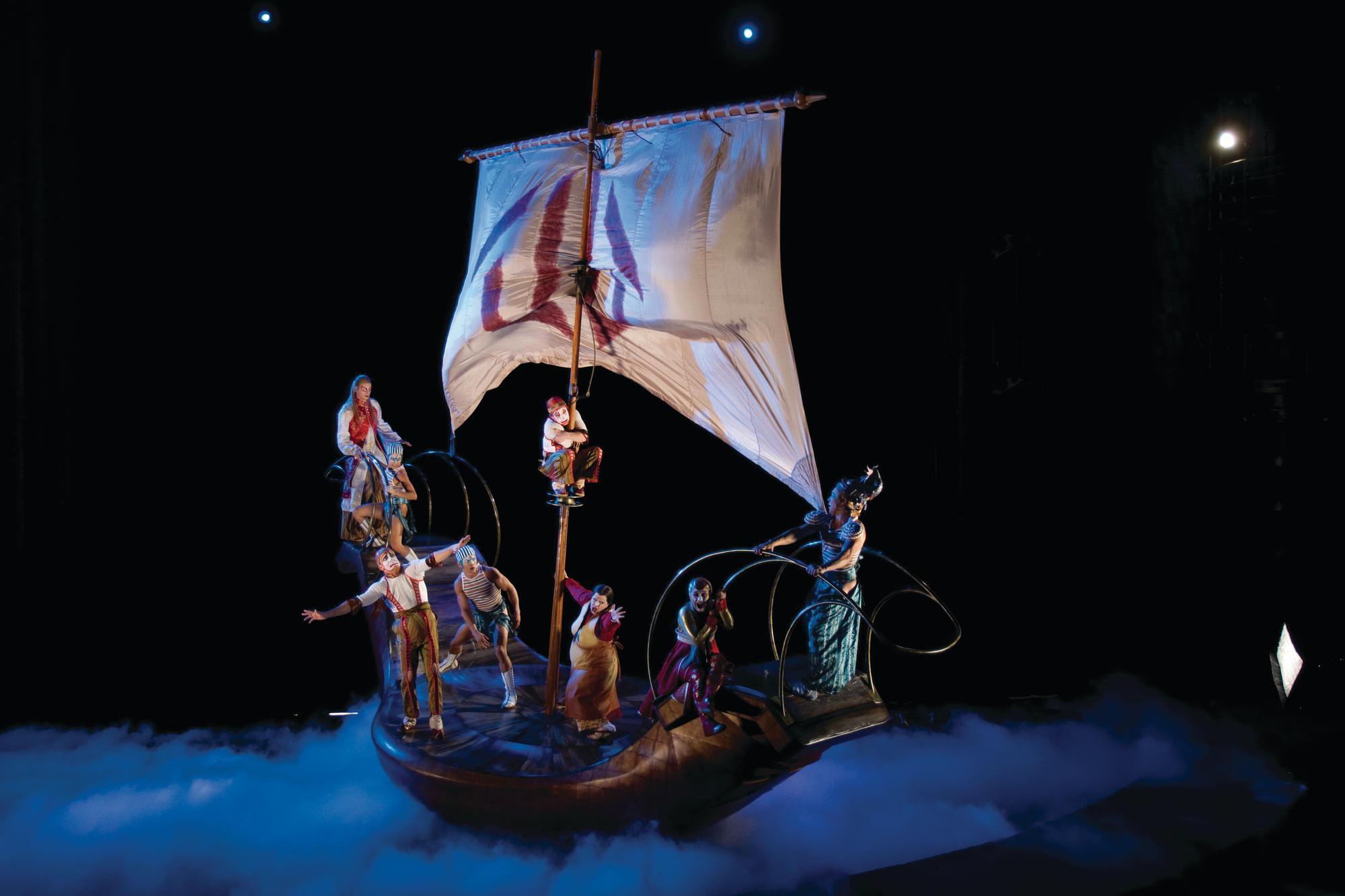 A live performance of KA by Cirque du Soleil. To escape the Archers and Spearmen, the Nursemaid drags the Twin Sister onto a boat and they escape by sea, leaving behind the injured Twin Brother.