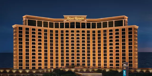 Exterior of Beau Rivage at night shows 13 floors and over 200 windows on the facade.