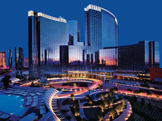 Exterior of ARIA with two thin mirrored-glass, curved buildings with 28 floors each.