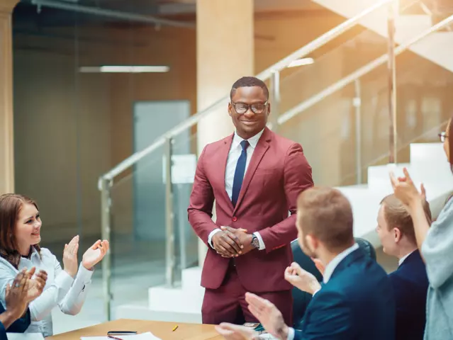 Young African American Business Man leading a team